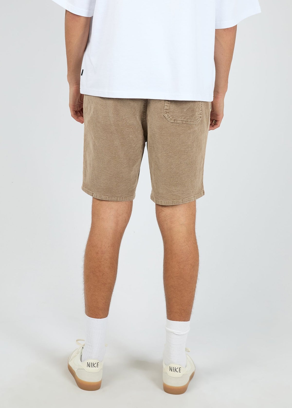 Back of the mocha corduroy short showing the patch pocket