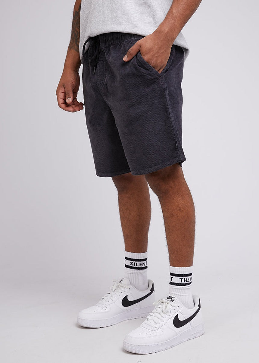 Detail of the side pocket on the washed black corduroy short
