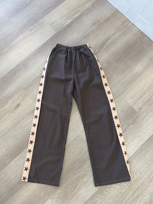 Star Pants Brown/Beige flat lay, star racer stripe down each leg